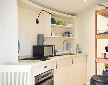 Our modern self catering accommodation in Braes near Portree contains an oven microwave and dining table