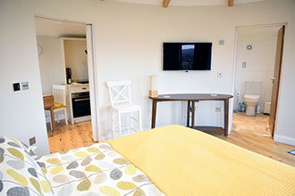 Our modern self catering accomodation contains a king size bed en suite bathroom and modern well equipped kitchen